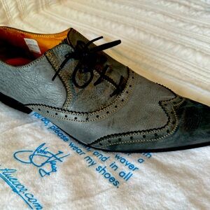 Fluevog Tokyo Nogoya’s in grey and black. All leather, men’s size 12.